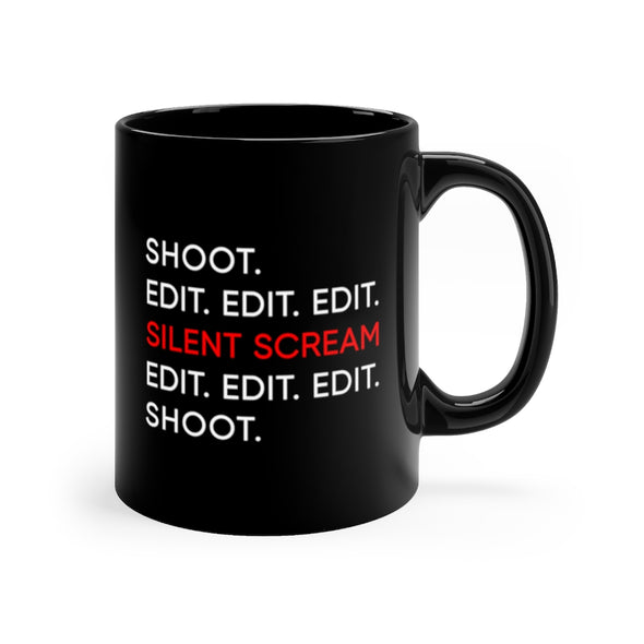 Black, 11 ounce, ceramic mug with the words "Shoot Edit Edit Edit Silent Scream Edit Edit Edit Shoot" in white and red.