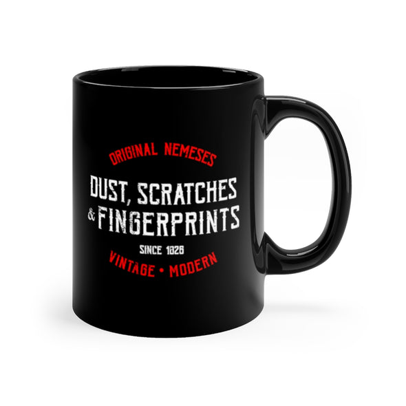 Black, 11 ounce, ceramic mug with the words Dust, Scratches and Fingerprints in white and red.